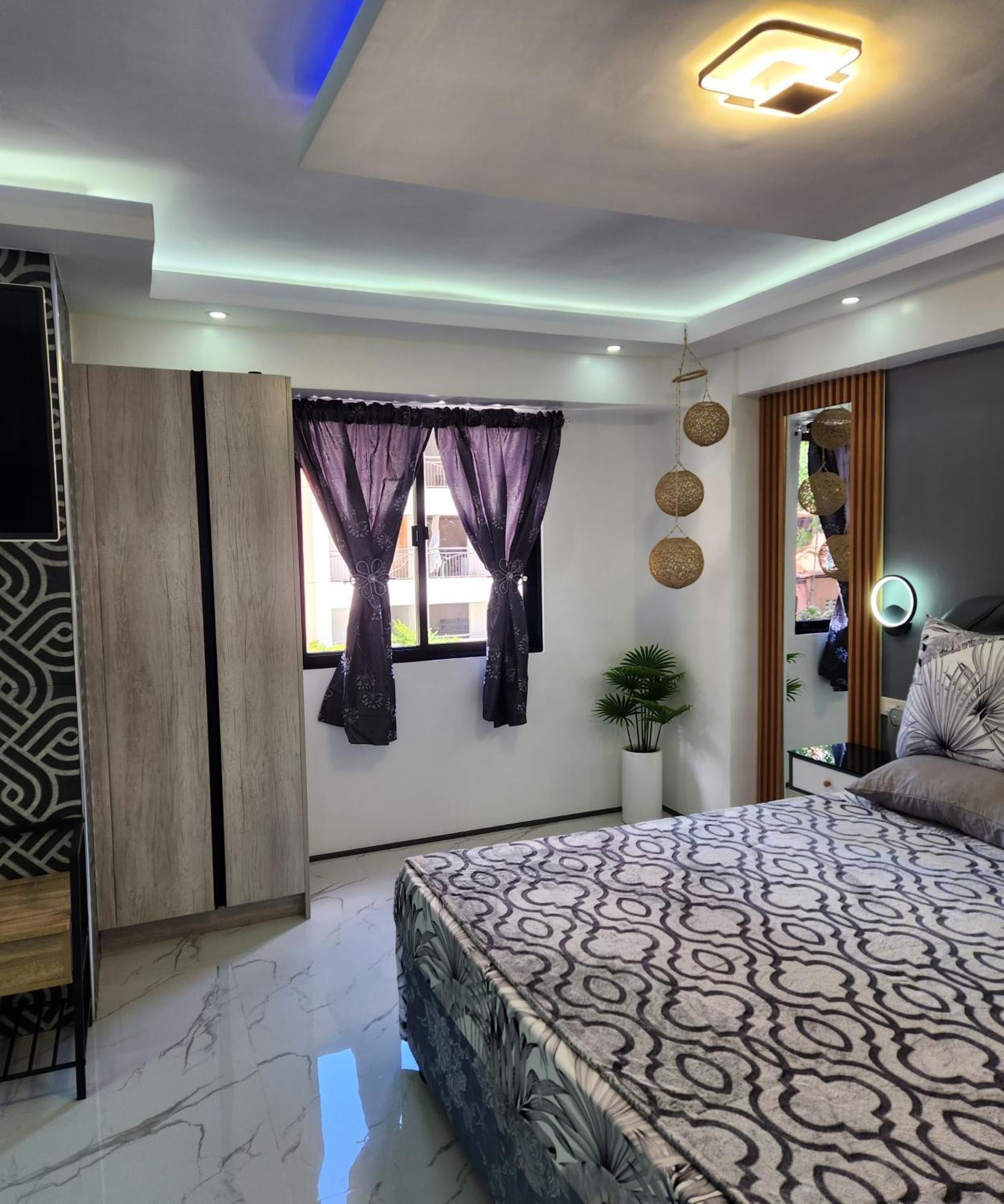 Condo Azur Suites B207 Near Airport, Netflix, Stylish, Cozy With Swimming Pool 麦克坦 外观 照片